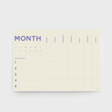 Lettuce A2 monthly desk and wall planner with colourful undated monthly pages and sticker sheet