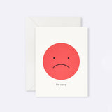 Greeting card featuring a sad face illustration with I'm Sorry message