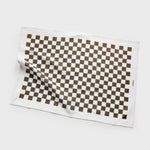 Lettuce Micro Checkers 100% linen tea towel folded in kitchen