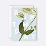 Greeting card featuring a floral birthday illustration